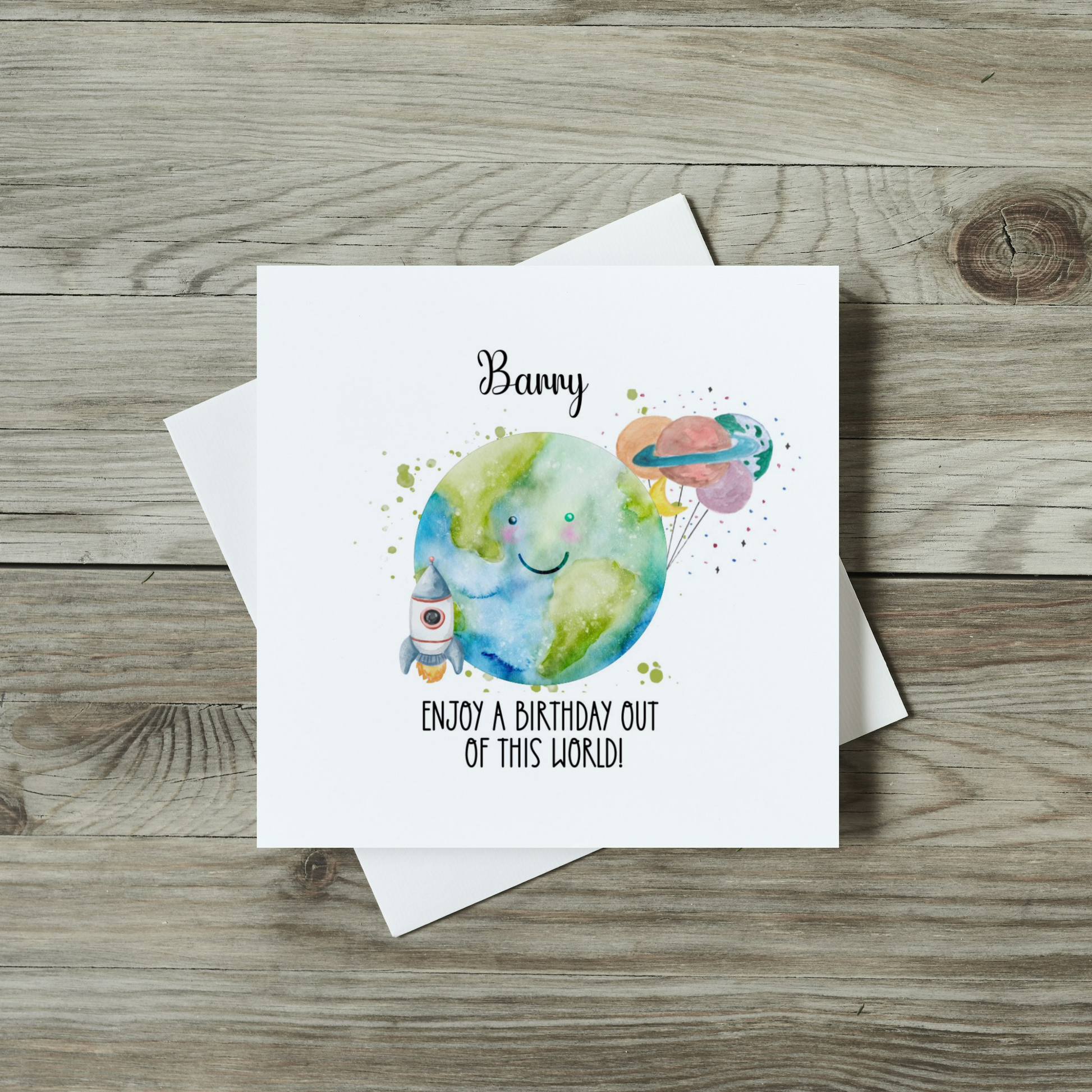 front of birthday card with earth and planet balloons