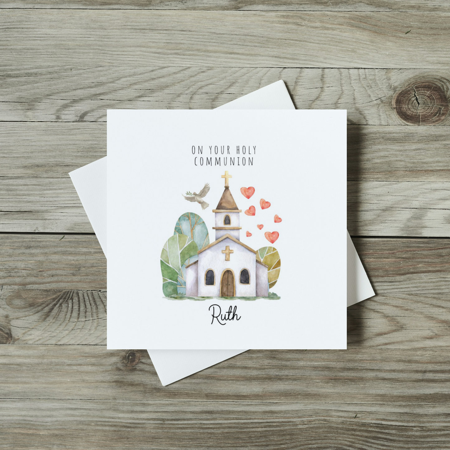 front of communion card featuring watercolour church, dove and hearts on your baptism