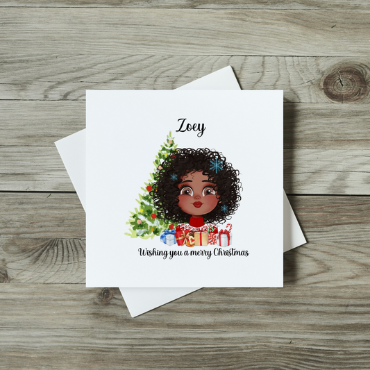 front of childrens christmas card with cute black girl, christmas presents and christmas tree