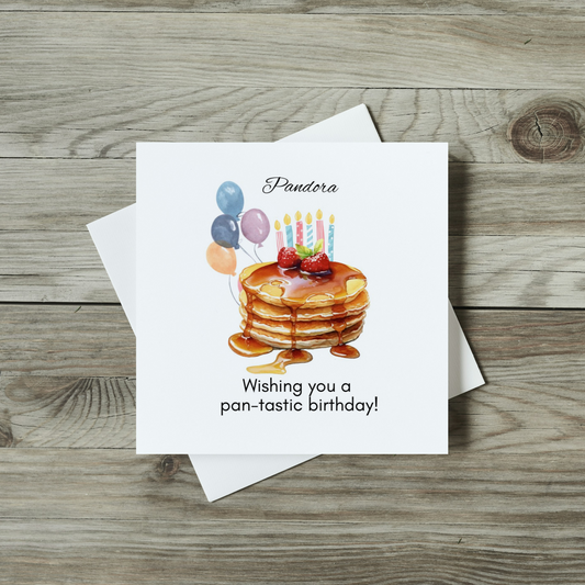 front of birthday card, watercolour pancake stack with birthday candles and birthday balloons 